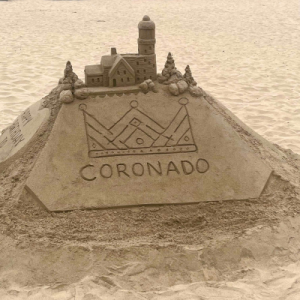 A crown-bearing sandcastle on Coronado Beach at Hotel del Coronado.