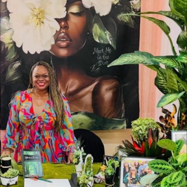 Barbara Lawson poses inside her Meet Me in the Dirt shop in Manhattan Beach.