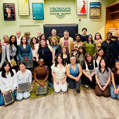 An Omega Sci-Fi group shot of The Tomorrow Prize finalists, teachers and board members at Vroman's Bookstore.