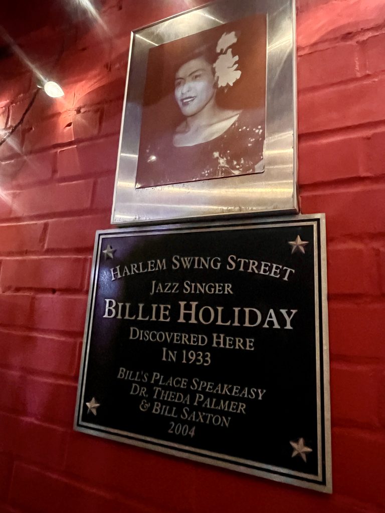 Photo and plaque honoring Billie Holiday at Bill's Place in Harlem.