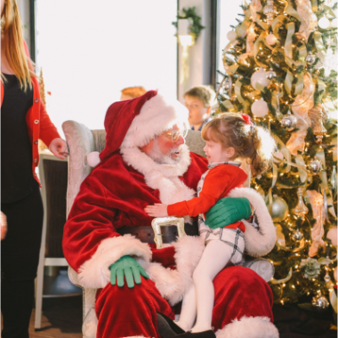 Santa Claus greets children and families aboard a City Cruises yacht in Marina del Rey.